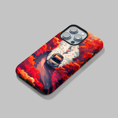 Autumn Drive (iPhone Case 11-15)Elevate your iPhone's protection and style with RimaGallery's A car journey through a fiery autumnal forest On case, featuring dual-layer defense and a sleek, glossyRimaGallery