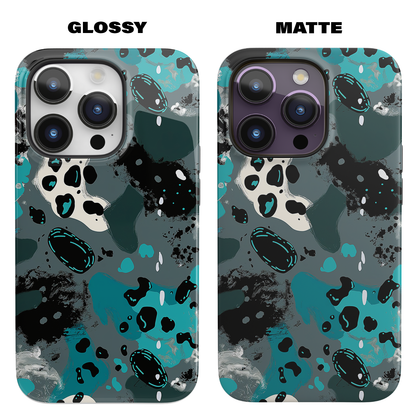 Aqua Abstract (iPhone MagSafe Case)Elevate your iPhone's protection and style with RimaGallery's Abstract teal and black speckled pattern on iphone MagSafe Case against a dark backdrop. Enjoy dual-layRimaGallery