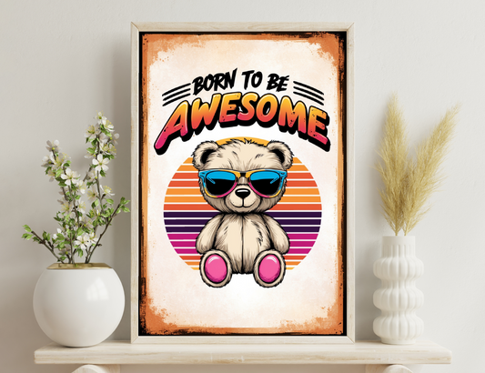 Born to be awesome illustration with a cute teddy bear wearing sunglasses and sitting against a colorful retro sunburst background.
