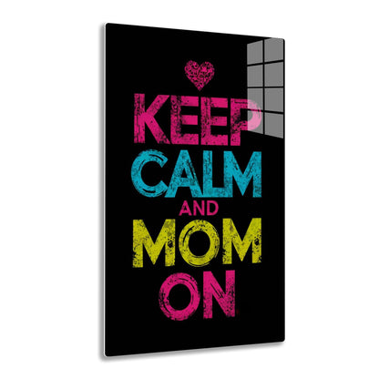 Keep calm and mom on - Colorful typographic design with the words "Keep Calm and Mom On" in shades of pink, teal, and yellow on a black background, with a heart symbol made of floral patterns.
