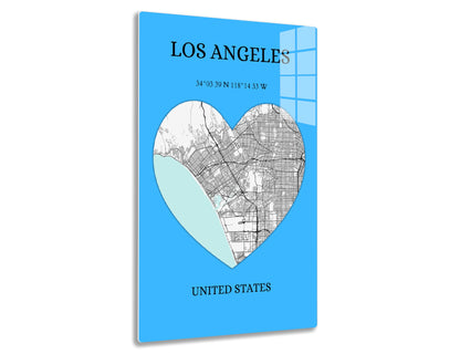 Map of Los Angeles in the shape of a heart, with the city grid on one side and topographic features on the other, on a blue background.
