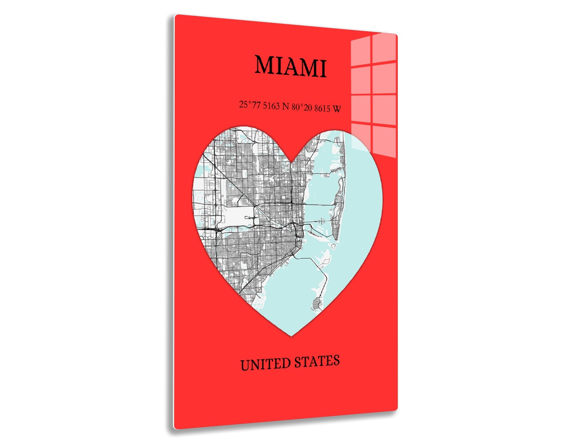 Map art of Miami in the shape of a heart, with the street grid on the left and water areas on the right, set against a red background with city name, geographical coordinates, and country.
