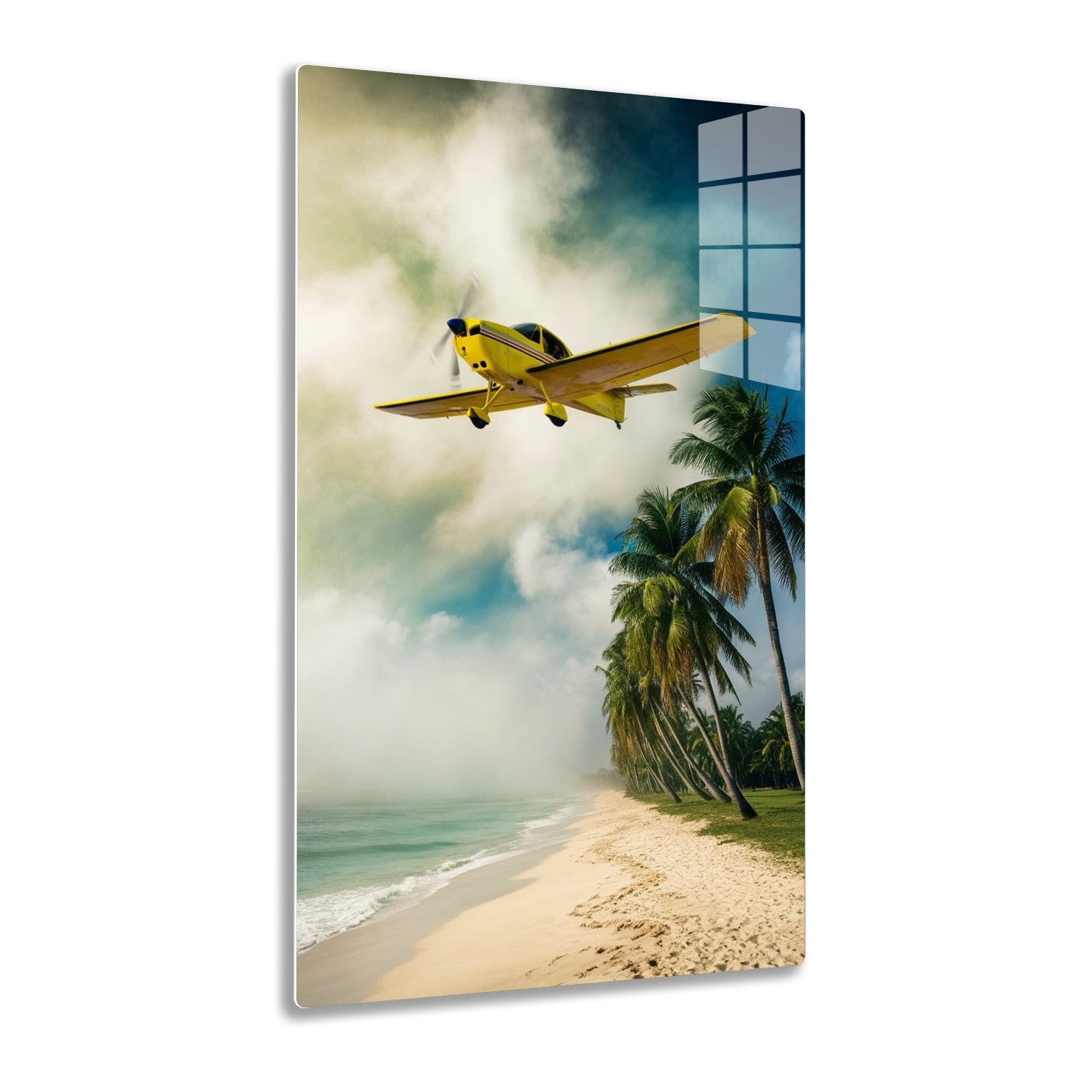 A small yellow plane flies low over a tropical beach with palm trees lining the shoreline and a cloudy sky in the background.
