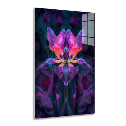 A vibrant, symmetrical floral mandala formed by the petals of a stylized tulip rendered in shades of pink, purple, orange and blue, creating an abstract and mesmerizing kaleidoscopic pattern.
