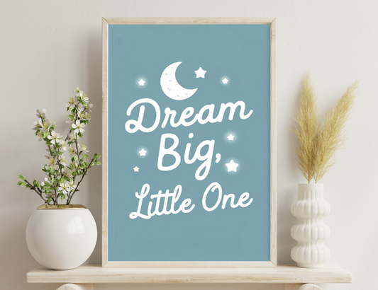 Dream Big, Little One illustration with crescent moon and stars against blue background
