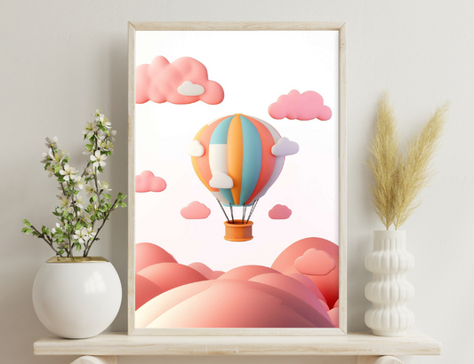 A colorful hot air balloon soars among pink and white clouds against a plain background, with rolling pink hills below.
