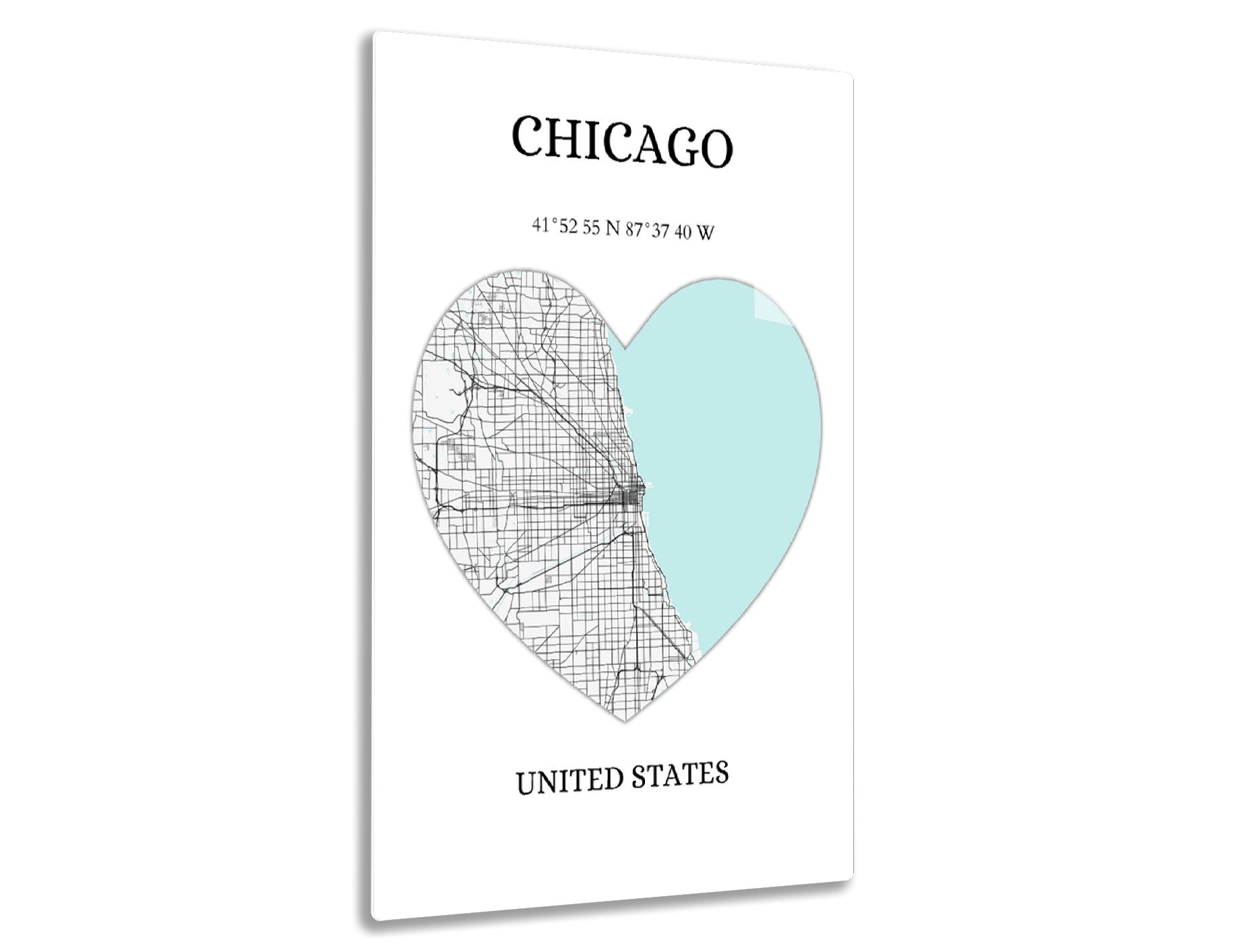 Image showing a stylized heart shape made of a street map outline on one side and a solid teal color on the other, representing the city of Chicago with its geographic coordinates and the text "UNITED STATES" below.
