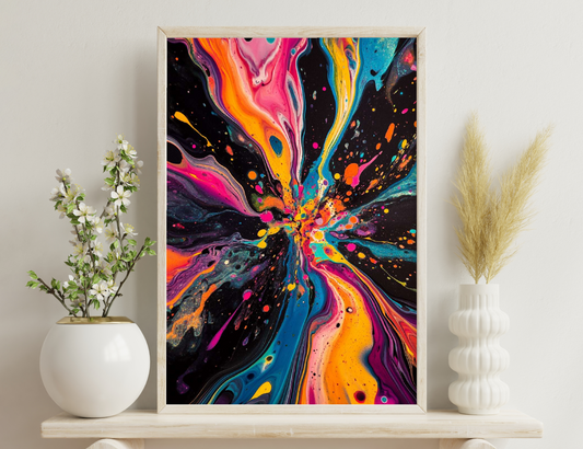 Colorful abstract fluid art explosion with vibrant pink, orange, blue, and yellow paint splashes on a black background, resembling a cosmic burst or fireworks.
