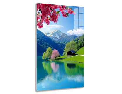 A serene alpine landscape with snow-capped mountains, a calm lake reflecting the surrounding trees in full pink blossom, a traditional wooden cabin, and lush green meadows under a bright blue sky.
